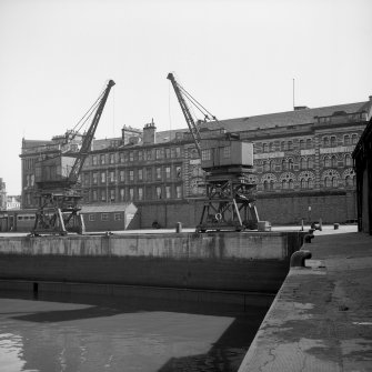 Glasgow, Kingston Dock
View of travelling cranes at E end of dock, from SW