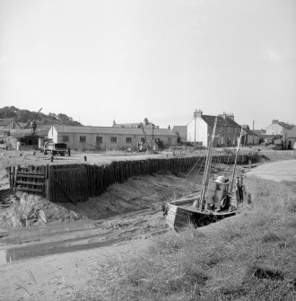 Palnackie Harbour
View from NNE showing NW facing quay with boat in foreground