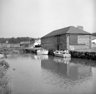 Kingholm Quay
View from WSW showing NW and SW fronts of N warehouse with basin in foreground