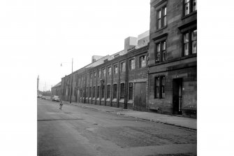 Glasgow, 27 Byron Street, The West End Sanitary Steam Laundry
View from NW showing NNE front of laundry and engineering works with part of NNE front of tenement in foreground