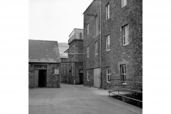 Galashiels, Hudderfield Street, Abbotsford Mill
View from WSW showing part of NW front of main block with N (central) block in background