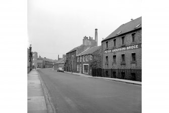 Galashiels, Hudderfield Street, Bridge Mill
View from SE showing part of SSW front of main block of Bridge Mill with house and Waverley Ironworks in centre
