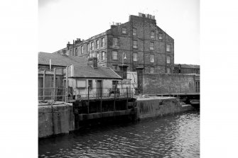 Edinburgh, Leith Docks, East Old Dock
View from NE showing N front of SE lockgate with 2-11 Dock Place in background