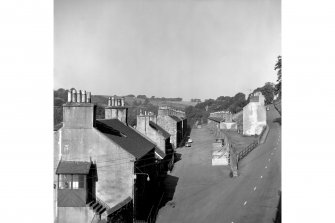 New Lanark, 3 Rosedale Street, Robert Owen's House
View looking WNW showing ESE and NNE fronts of number 3 with Long Row and numbers 5-127 Rosedale Street in background