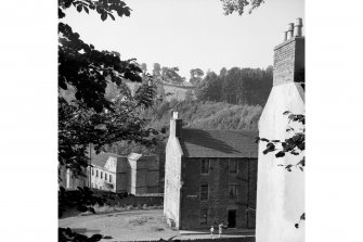 New Lanark, 9-47 Rosedale Street
View from NE showing SE front and part of NNE front of numbers 9-47 Rosedale Street with mill number 1 in background
