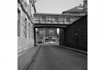 Dunfermline, Foundry Street, St Margaret's Works
View along Foundry Street showing connecting footbridge, from W