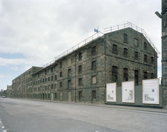 General view from South East of McDonald and Muir Bonded Stores, Commercial Street, Leith. (Originally paired with neighbouring stores to South East at 63 Commercial Street).