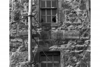 Edinburgh, Quayside Street, Quayside Mills, St. Ninian's Church and Manse.
View of inscribed lintel stone built into East wall of manse extension.
Insc: 'Blessed Are They Yat Heir Ye Vord Of God And Keip It...Luke....1600'.
