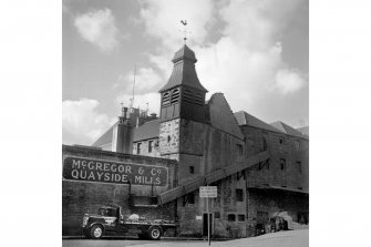 Edinburgh, Quayside Street, Quayside Mills.
General view with a truck underneath the long loading chute.