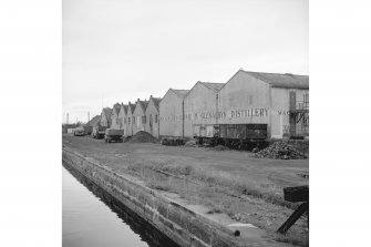 Inverness, Telford Street, Glenalbyn Distillery
View from Muirtown swing bridge showing warehouses backing onto canal, from SW