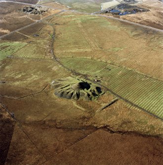 Lochend Colliery, oblique aerial view, taken from the ESE, showing the coal mine and spoil heap in the centre of the photograph, and an area of rig and plantation banks in the top half.