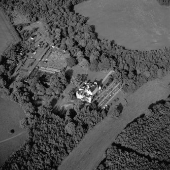 Winton House, oblique aerial view, taken from the SW, centred on the country house and garden.