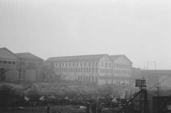 Glasgow, Pointhouse Shipyard
View from N showing NW and NE fronts of joiners' shop with part of Pointhouse Boiler Works on left