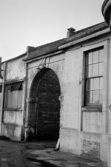 Glasgow, 229-231 Castle Street, St Rollox Chemical Works
View from SE showing S front of stone archway adjacent to office block