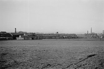 General view from SE showing Mungal Foundry with Carron Ironworks in background