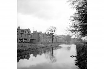 Deanston Mills, Dam and Lade
View from ESE showing lade with numbers 32-56 Teith Road in background