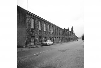 View showing the range of offices and warehouses which was built in 1876 along the front of the complex. The scale of the building indicates what a very large complex lay behind it. The spire marks the main entrance