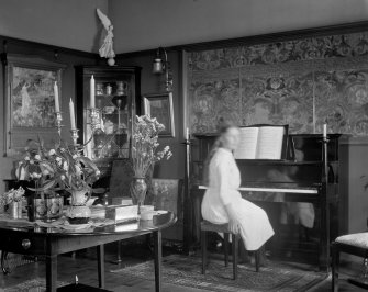 Drawing room, interior.
View of Miss Paterson at the piano.
Scanned image of DB 1405.