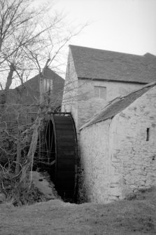 View from SE showing waterwheel and part of mill