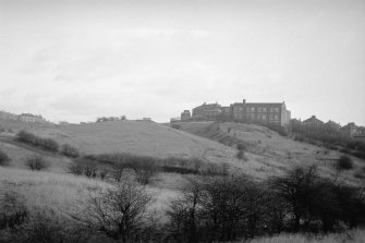 View from W showing route of canal inclined plane with Riddrie School in background