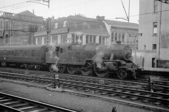View from WSW showing steam train at Central Station with Gardner's Warehouse in background