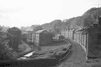 View from SE showing from left part of School, Institute, New Buildings and terraced houses