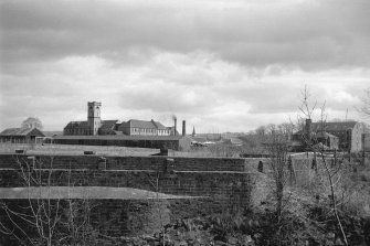 Distant view from WNW showing Viewfield Cabinet Works on left and Calderhaugh Silk Mill on right