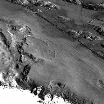 Oblique aerial view ofTraigh Na Criche, taken from the north east, centred on farmstead and cultivation remains.