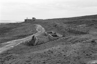 Filter tanks, view from North West with Wee Fea signal station behind.