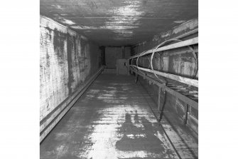 Tank access tunnel, view looking up access ladder to tank top.