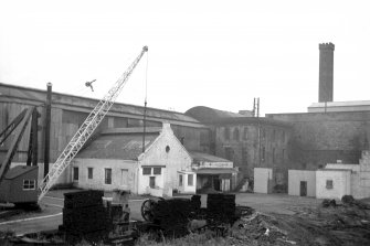 General view from SSE showing part of ESE front of foundry with blowing-engine house in background