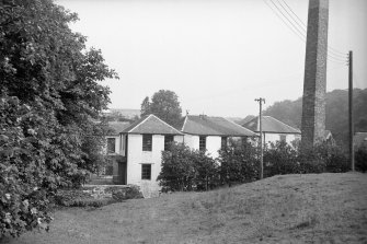 View from SW showing SSW front of central block with chimney on right