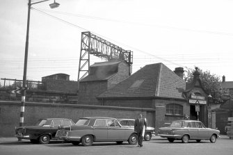 View from NW showing WNW front and part of N front of booking office