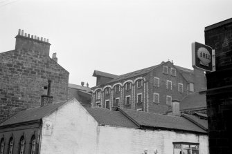 View from SW showing part of W and S fronts of S block