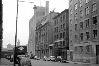 View from NNE showing ESE front of Washington Flour Mills with 84 Washington Street and part of Crown Flour Mills in foreground