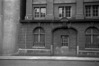 View from ESE showing blocked up entrance and date plaque on ESE front of Italian Renaissance block on Washington Street