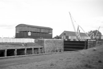 View from W showing N lock gate with workshops in background