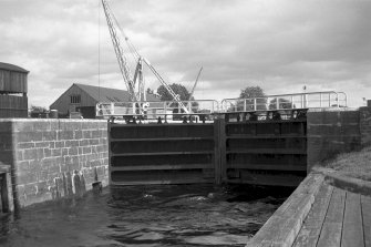 View from WNW showing N lock gate with workshops in background