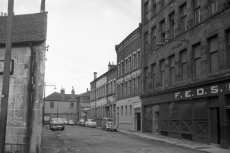 View from SW showing WNW front of pipe factory with works in background