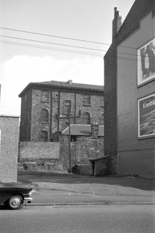 View from NW showing part of WNW front of W block and main block