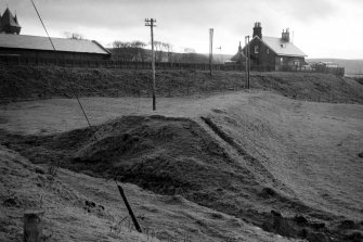 View from NNE showing tramway embankment with goods shed and Station House in background