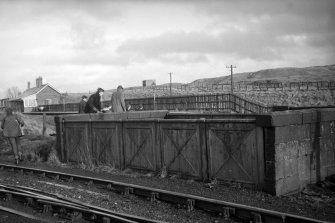 View from WNW showing cast-iron parapet of underbridge with main station building in background