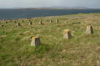 Scanned image of view of hut bases from East