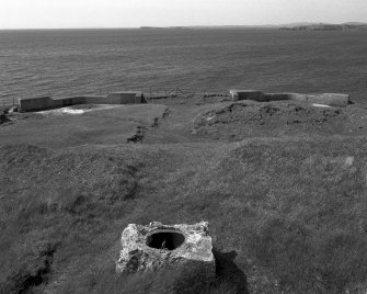 Scanned image of view of two World War I gun emplacements from roof of magazine to East