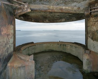 Scanned image of view of interior of search light No.4 showing rails for shutters