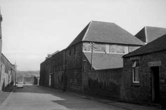 View from WSW showing NW front of original maltings (probably) and NW front and part of SW front of kilns