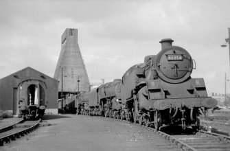 View from SSW showing locomotives at Eastfield Motive Power Depot with coaling tower in background
