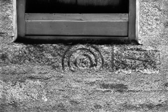 View of Pictish symbol stone reused as lintel..
Original negative captioned: 'Sculptured Stone above back-door at East Balhaggardy June 1914'.
