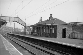 View from WNW showing W and N fronts of West-bound platform building with part of footbridge in background