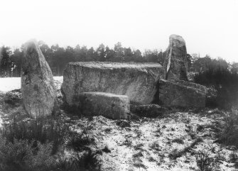 View of recumbent stone and flankers.
Original negative captioned: 'Stone Circle at Auchquhorthies, Inverurie. Recumbent Stone from N.E. inside circle / Dec 1902'.